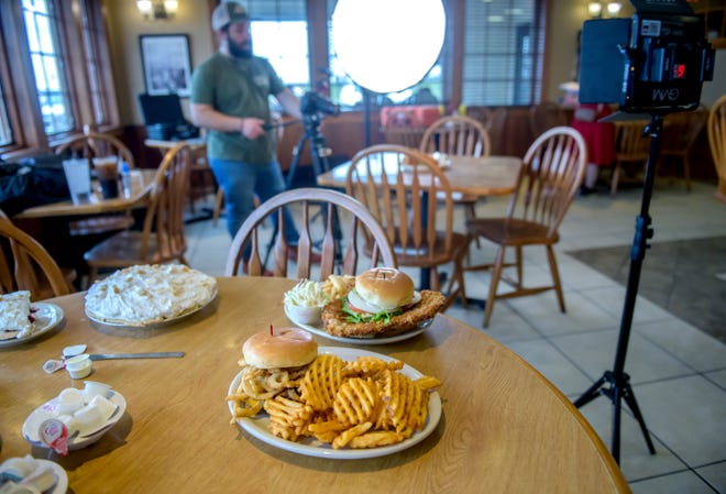 A selection of popular entrees sit on a table before being recorded for an episode of America's Best Restaurants on Wednesday, March 13, 2024 in Goodfield.