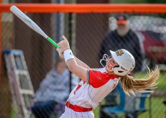 Metamora's Kaidance Till connects on a Washington pitch during their Mid-Illini Conference softball game Thursday April 25, 2024 at Jan Smith Field in Washington. The Redbirds defeated the Panthers 11-2.